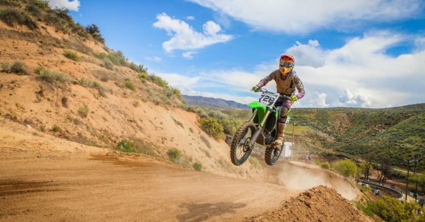 Bike Trails - Human Riding Motor and Jumped Under Blue Sky during Daytime