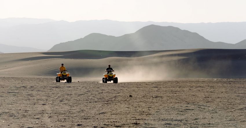 ATV - Two People Riding Atv on Desert