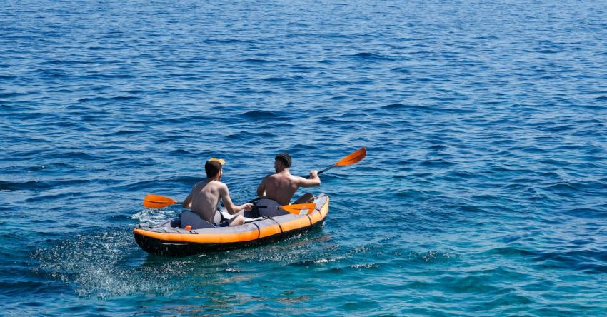 Kayak Excursion - Kayaking Duo on the Open Blue Sea