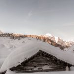 Mountain Cabins - Brown Wooden Houses Covered in Snow at Daytime