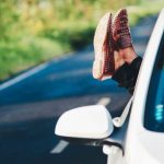 Road Trip - Person Wearing Pair of Brown Leather Loafers