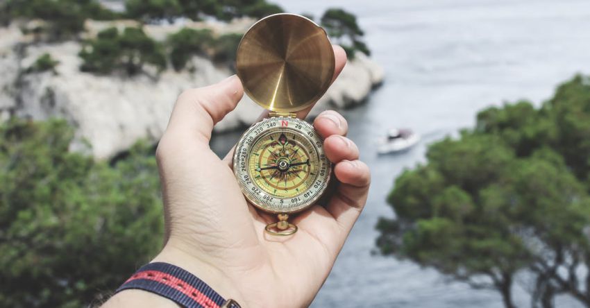 Compass - Person Holding Compass